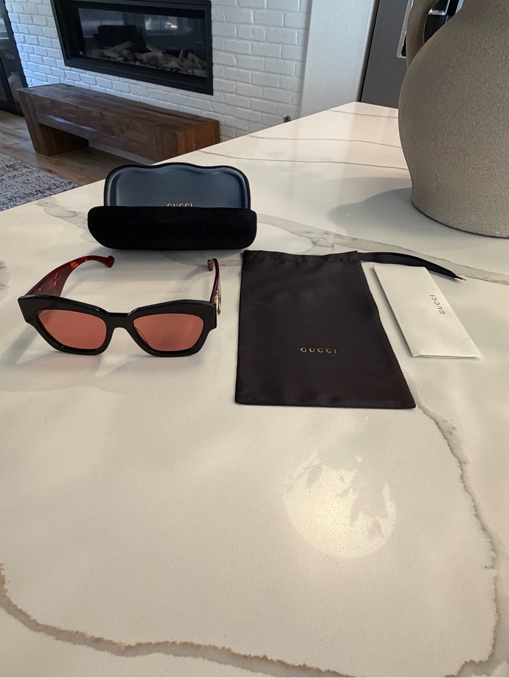 Gucci Black Frame Sunglasses with Red Temples and Pink Lenses